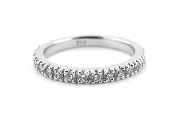 Claw set diamond wedding ring