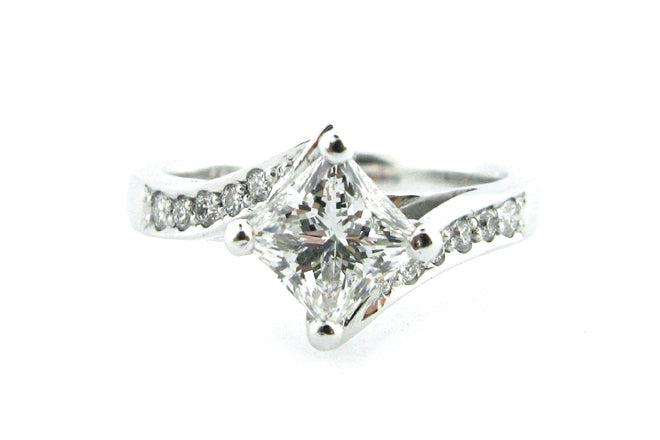 Princess cut diamond ring set on the diagonal with a twisted band