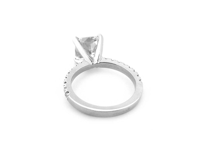 Cushion cut diamond ring with bead set diamonds