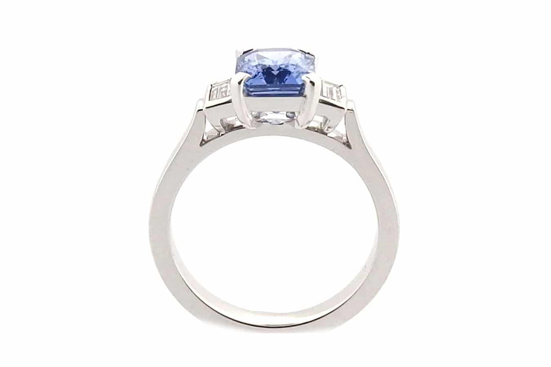 Radiant cut blue sapphire and diamond ring
