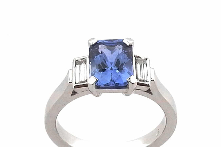 Radiant cut blue sapphire and diamond ring