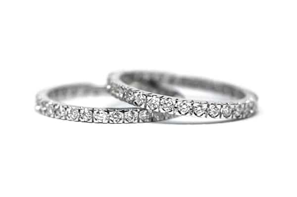 Matching claw set diamond rings