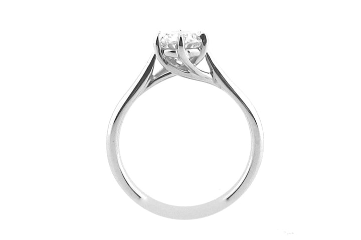 Six claw round brilliant cut twisted ring