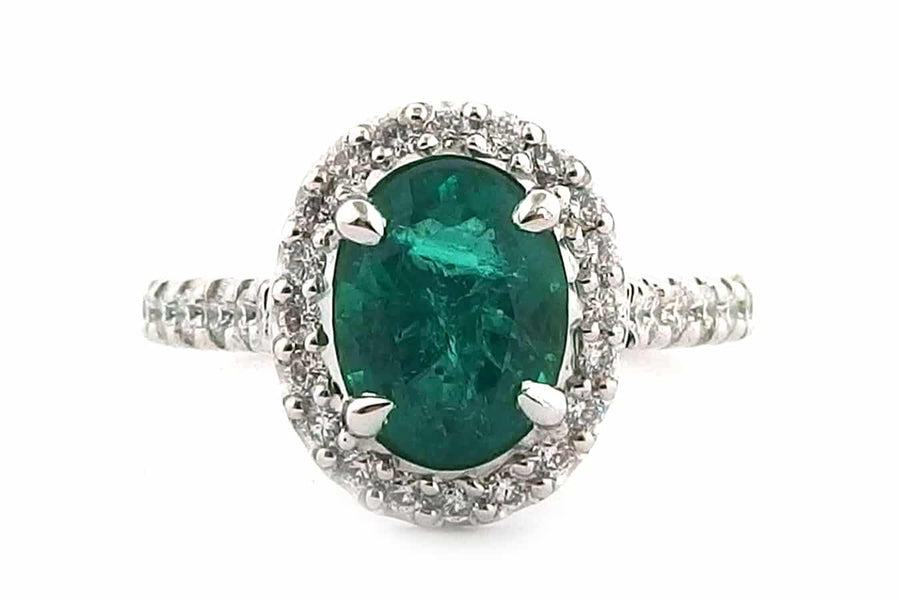 Handmade 18ct White Gold Halo Ring Set With an Oval Cut Emerald