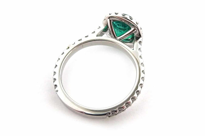 Handmade 18ct White Gold Halo Ring Set With an Oval Cut Emerald