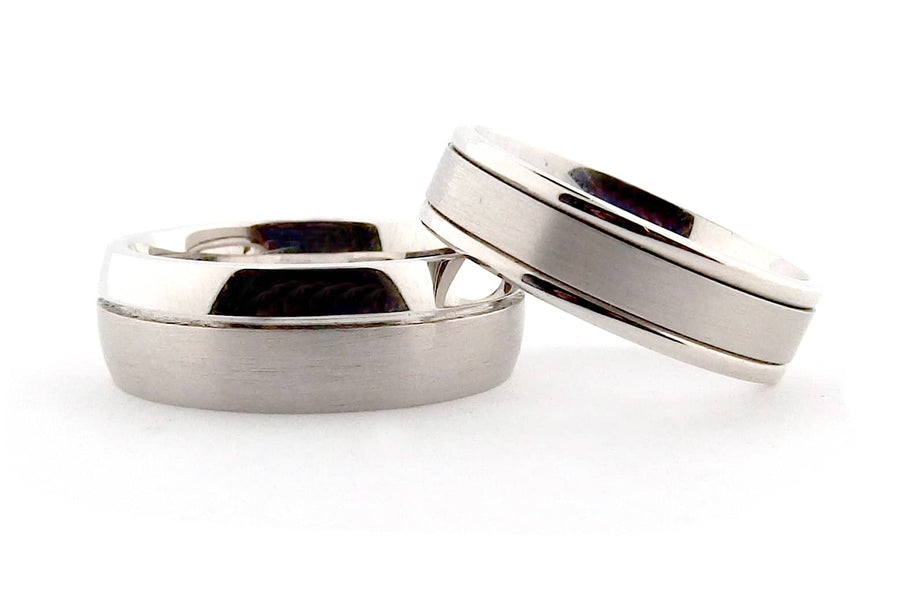 A set of men's brushed and polished same sex rings