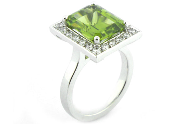 Peridot and diamond halo ring