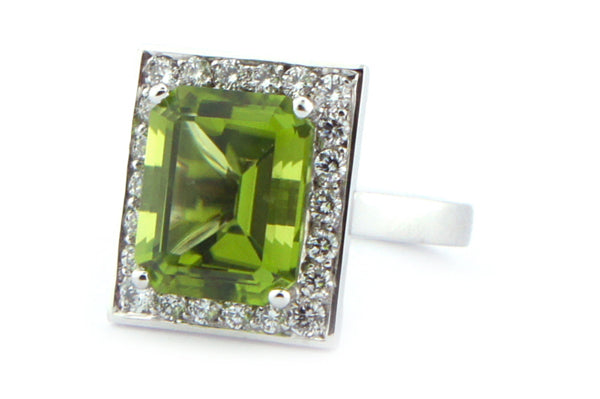 Peridot and diamond halo ring