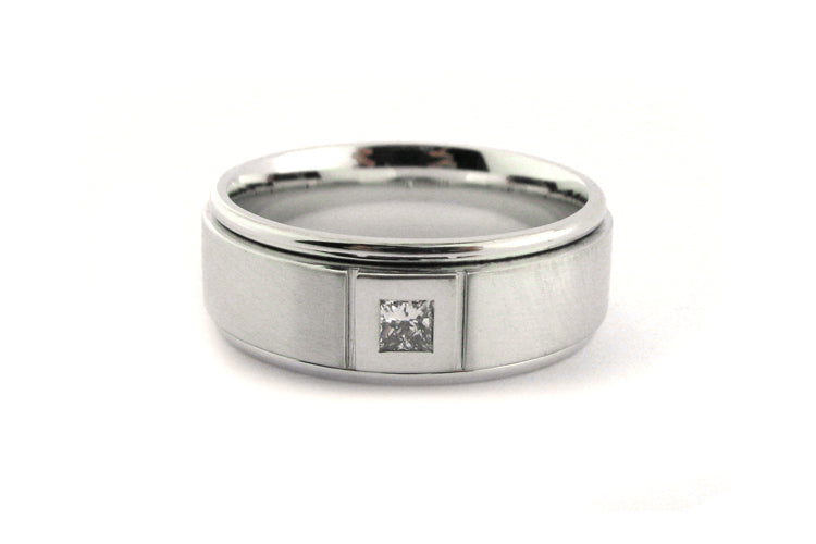 Princess cut white gold ring with a brushed and polished finish