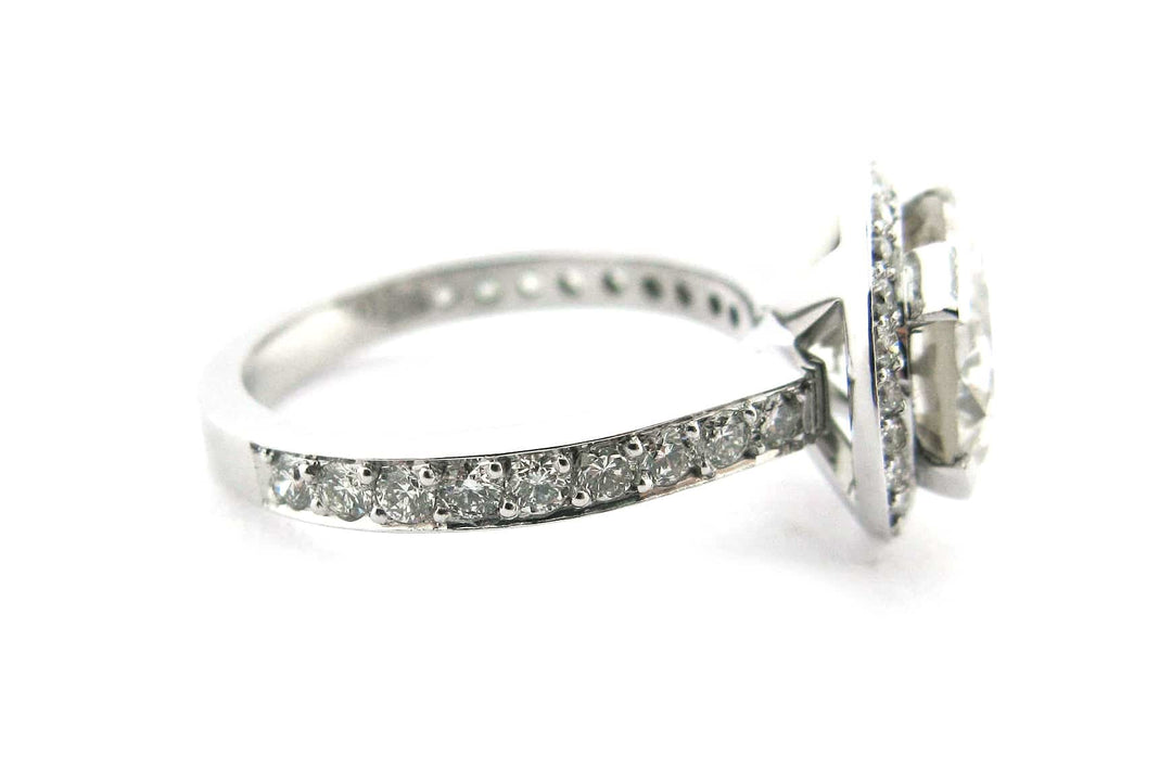 Round brilliant cut diamond ring set with long claws
