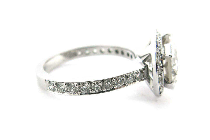 Round brilliant cut diamond ring set with long claws