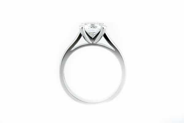 Round brilliant cut four claw ring