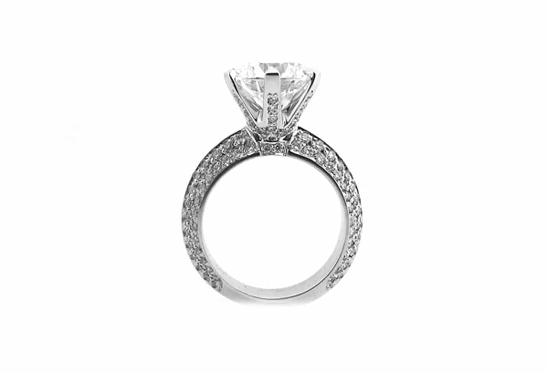 Round brilliant cut with diamonds on the band and setting