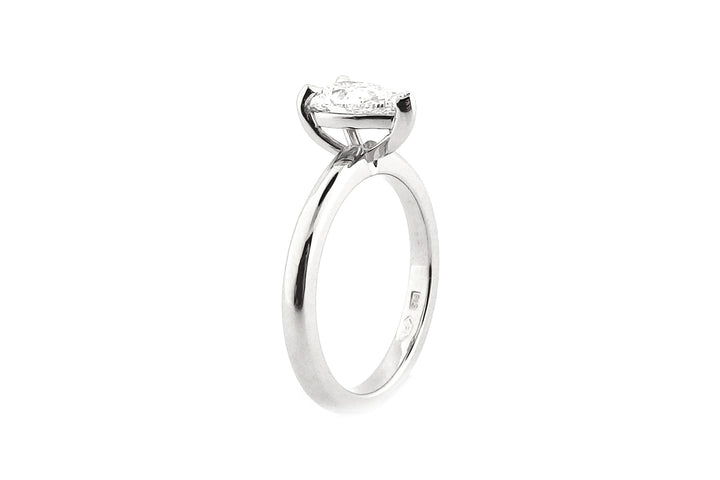 18ct white gold pear shape diamond ring, claw set, rounded band