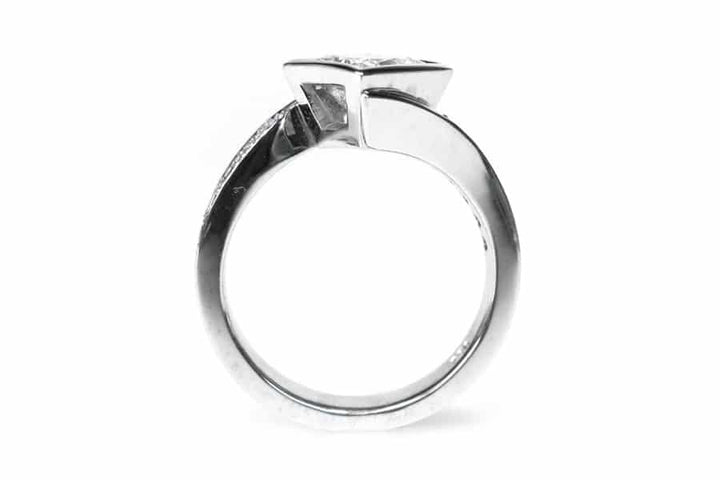 Bezel set princess cut diamond ring with a twisted band