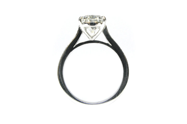 Pear shape diamond ring with bead set diamonds