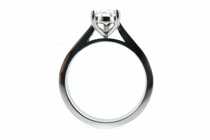 Pear shape diamond ring with channel set diamonds