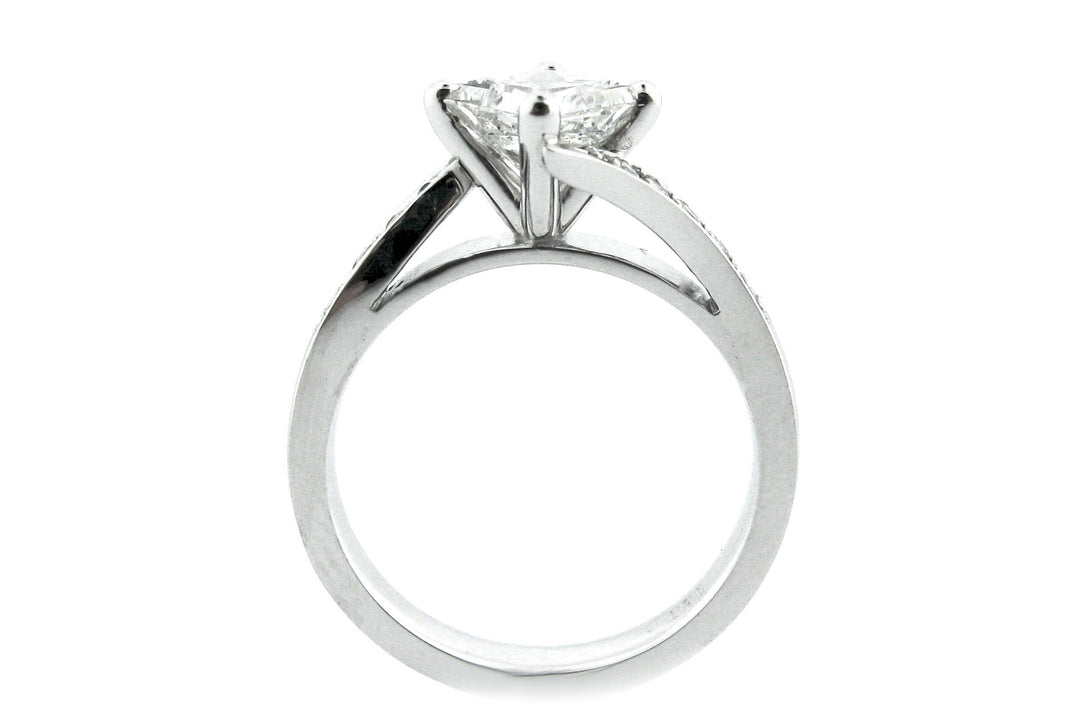 Princess cut diamond ring set on the diagonal with a twisted band