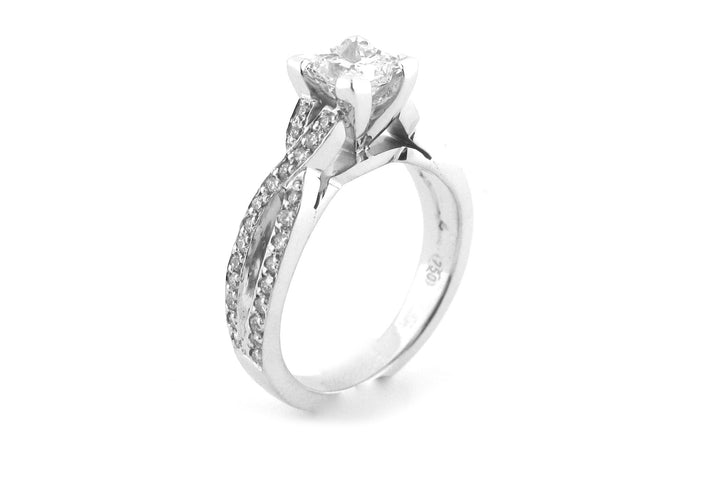 Princess cut diamond ring with a double twisted band