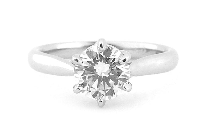 Six claw round brilliant cut twisted ring