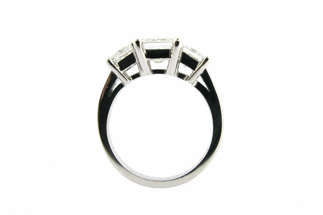 Three stone princess cut diamond ring