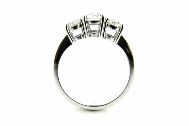 Three stone round brilliant cut diamond ring