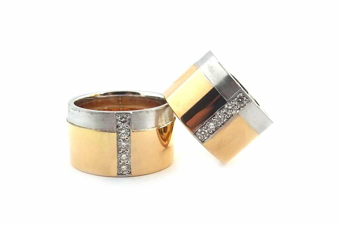 Two tone same sex ring set with bead set diamonds