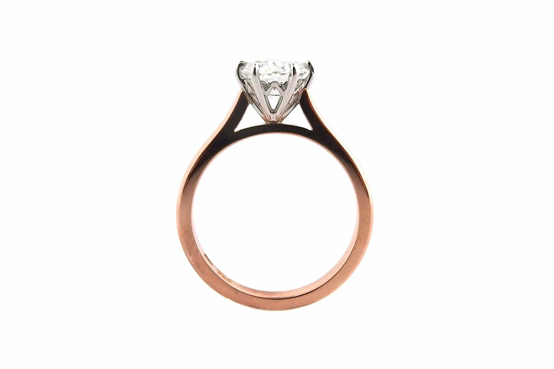 White and rose gold round brilliant cut ring