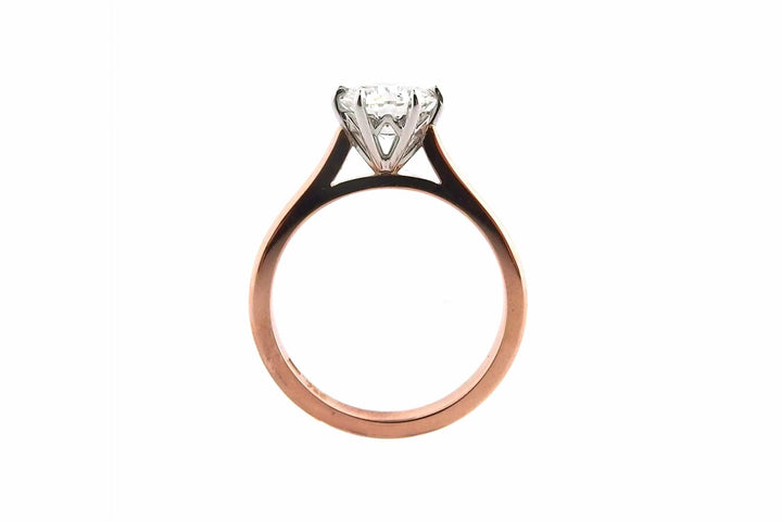 White and rose gold round brilliant cut ring