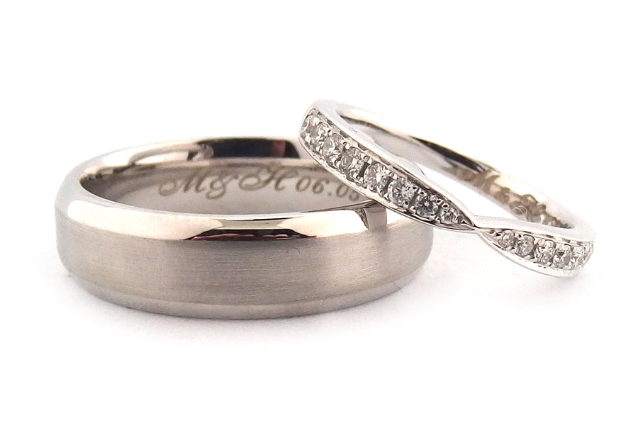 white gold mens wedding ring and a diamond set white gold womans wedding ring