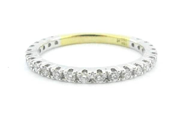 Yellow and white gold claw set wedding ring