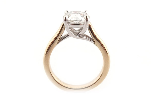 Yellow and white gold round brilliant cut cross over ring