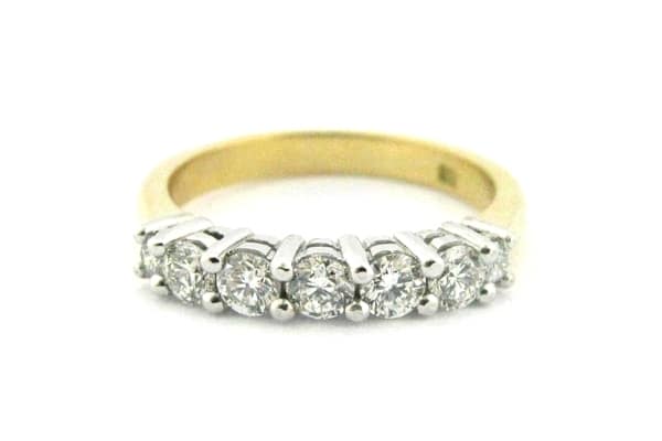 Yellow and white gold seven stone ring