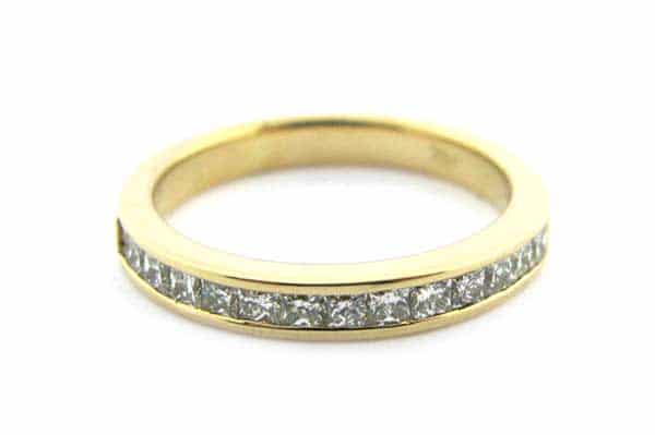 Yellow gold channel set ring