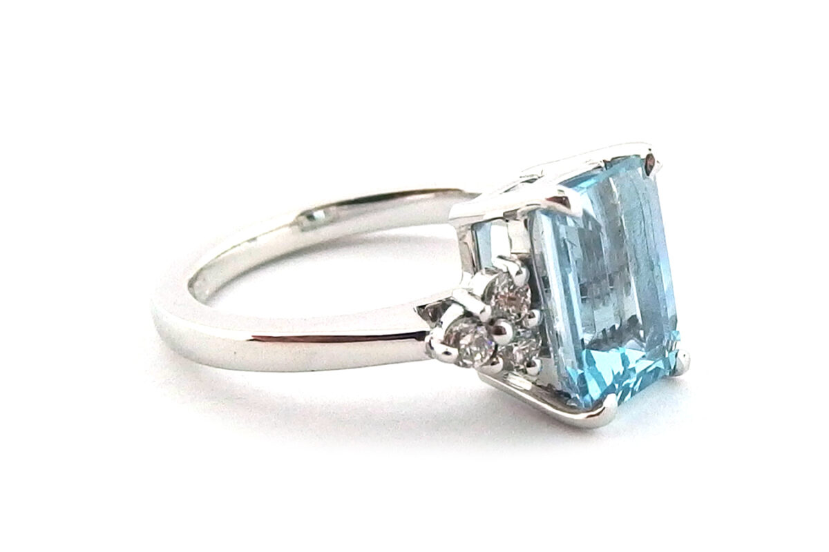 1.87ct Emerald cut Aquamarine set in a handmade 18ct white gold ring with six brilliant cut claw set diamonds