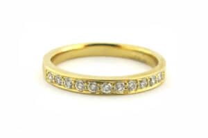 Yellow gold full eternity bead set wedding ring