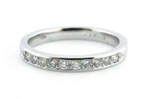 Bead set half eternity ring