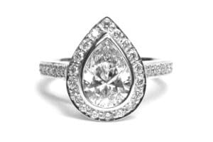 Bezel set pear shaped diamond halo ring teardrop