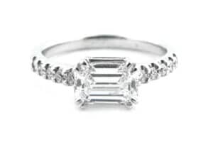 Horizontal emerald cut with claw set diamonds front view