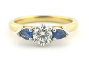 Sapphire and diamond three stone ring