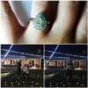 Man proposing to woman with yellow gold pear shaped gemstone in double halo
