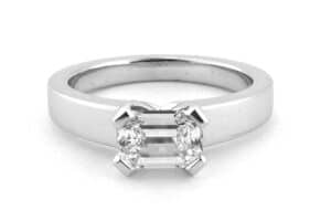 Horizontally set emerald cut diamond ring