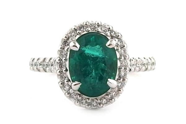 oval cut emerald halo ring