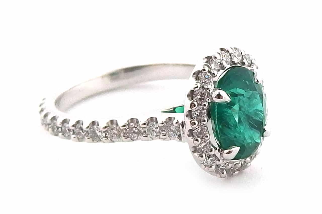 oval cut emerald halo ring side view
