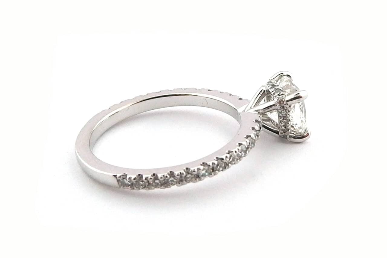 Cushion cut with diamonds in the setting back