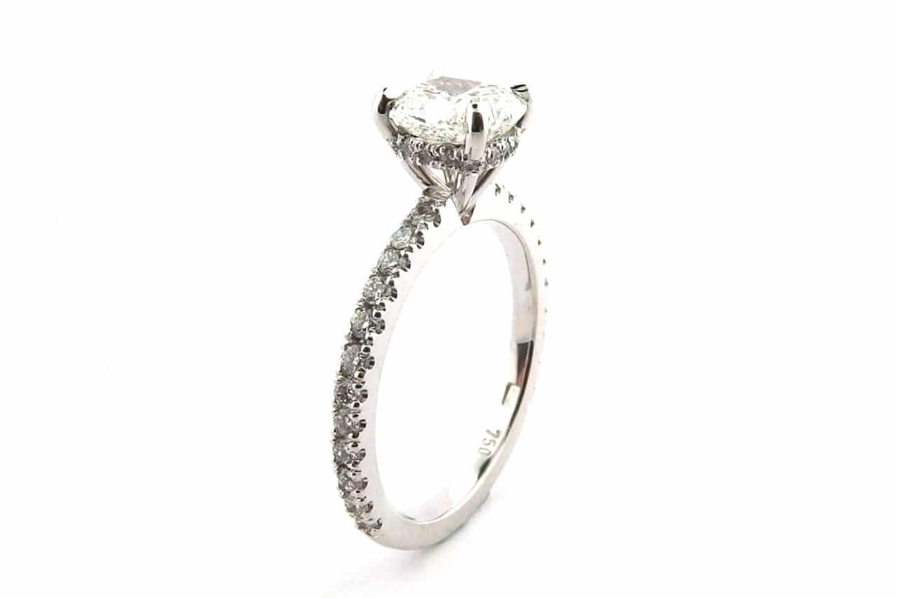 Cushion cut with diamonds in the setting side