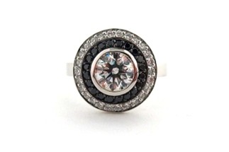 Art Deco statement ring wiht white diamonds and black diamonds